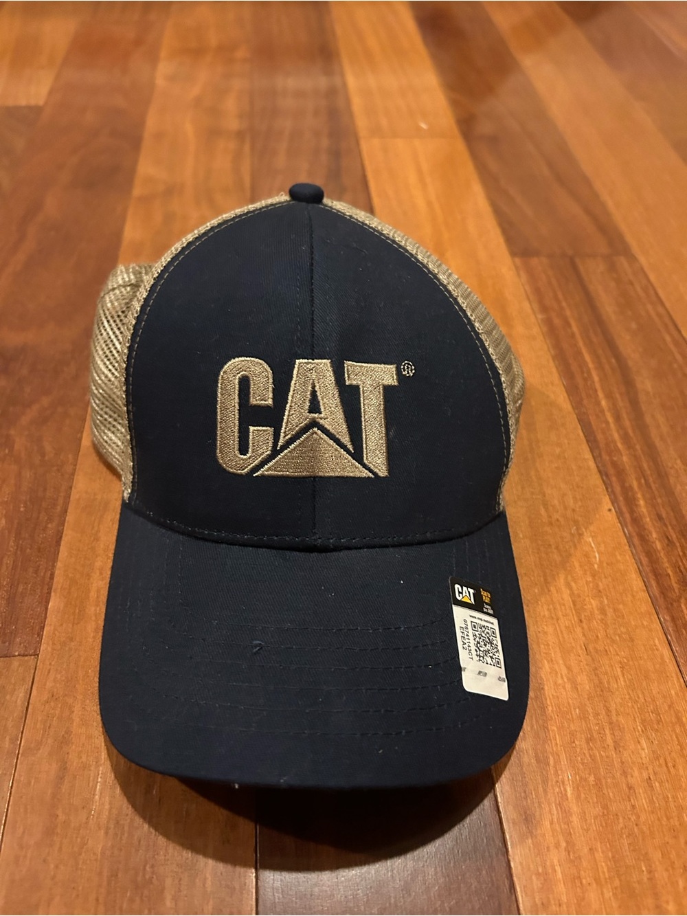CAT Black and Gold Logo Trucker Hat